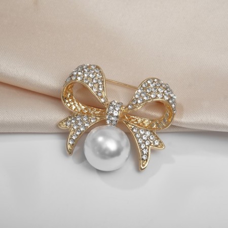 Brooch "Pearl" classic bow, white color in gold