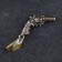 Talisman keyhole "Revolver", natural amber