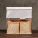 Paper package, with a window, rectangular bottom, white, 22 x 11 x 28 cm