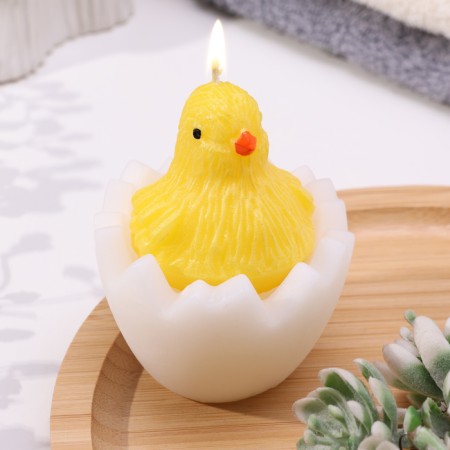 Decorative candle "chicken in the egg"