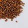 Beads "Astra" 11/0, 20 g (308 brown/transparent with a color center)