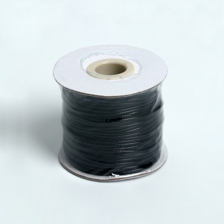 The cord waxed on the bobin d = 1.5 mm, l = 50 m, the color is black