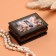 Casket "Angel with a watering can", black, 6 × 9 cm, lacquer miniature