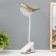 Table lamp on the clothespin "Bird" LED 3000-6000K 5W USB gold 20x7x34cm RISALUX