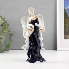 Souvenir porcelain angel with a cobalt drum 20cm