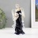 Souvenir porcelain angel with a cobalt drum 20cm
