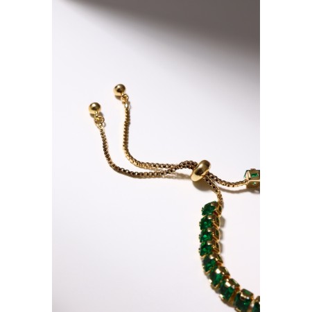 Bracelet with rhinestones "shine" on a puff, emerald color in gold-2