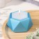 Candle "Hexagon. Marble" in the candlestick of gypsum is small, 7x3.5cm, blue
