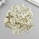Protective corner for the album Metal "Curls" set 100 pcs gold 1.4x1.4 cm