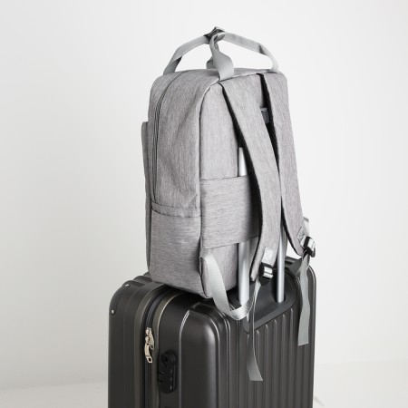 A backpack of textiles on a zipper, 3 pockets, a laptop, color gray-6