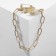 Brooch "Chain" with hooks, white color in gold
