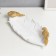 Souvenir Polystone stand "Golden parrots on a white sheet" 6x28x12 cm