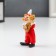 Souvenir Polystone "Clown with guitar" red 7x3x4.3 cm