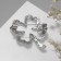 Brooch "Clover" contour, silver color