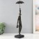 Polystone souvenir "Man with an umbrella. Flight" for metal 10.8x10.4x44.6 cm