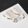Earrings with rhinestones "Bloom" hanging ball, white color in gold