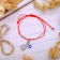 Bracelet-reinforcing "red thread" an eye and a turtle, the color is blue with black silver, d = 7 cm