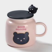 Ceramic mug with a spoon 