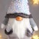 Interior doll "Santa Claus in a white-pearl cap and a vest with sequins" 55x16x22 cm 62601