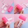 A video for cleaning clothes in a silicone case, 17 × 11 × 6 cm, pink color