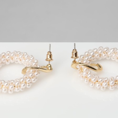 Earrings with pearls "circles" on the ring, the color is white in gold-2