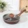 Granit Ultra Red, D = 26 cm pan, plastic handle, glass cover, anti -stick coating, brown color