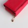 Women's wallet on the button, pink color