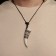 Set 2 objects: pendant, keychain "Fang", white color in silver, 44 cm