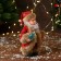 Santa Claus "In a patterned fur coat with a Christmas tree" 19 cm, brown-red