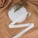 The elastic band is perforated, 20 mm, 25 m, white color