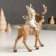 Souvenir Polystone "Baby-Angel in a gray outfit, riding on a deer" 5.5x14x14.5 cm