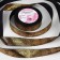 Satin tape with embossing "Snake", 25 mm, 23 ± 1 m, black/gold color