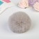 Pompon artificial fur "light gray" d = 7 cm