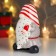 Souvenir Ceramics "Santa Claus, gray caftan, striped cap, with a bell" 15x11x9.5 cm
