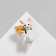 Broach "Bunny" with a bouquet, colored in gold