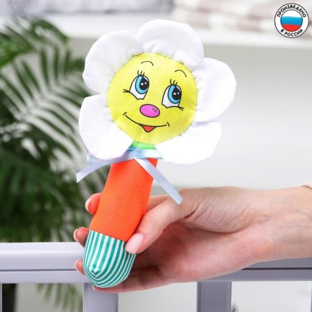 A rattle on the stick "Chamomile", color mix