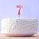 Candle for the cake, the number "7", pink.