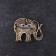 Brooch "Elephant", brass, amber