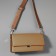Genuine leather bag, adjustable, with carbines, 60 ± 2 cm × 2.5 cm, beige/silver color