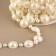 Pearls on threads, flat, 12 mm, 9 ± 1 m, milk color