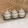 A set of ceramic cans for spices on a hedgehog metal stand, 200 ml, 3 pcs, white color