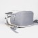 School backpack from textiles on lightning, 3 pockets, white/gray color