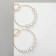 Earrings with pearls "Tenderness" Two rings with beads, white color in gold