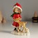 Souvenir Polystone "Girl in red with a deer" 10x6x13 cm