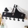 Decorative metal hooks "Dancing steam near the piano" black 24x9.5x37 cm