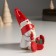 Suvenir Polystone "Santa Claus and granny with a gift, sit" 10x7.5x10 cm