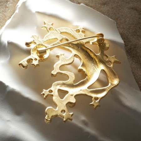 Brooch "Cosmos", white color in matte gold-1