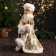 Snow Maiden "In a clutch with fur bombs" 43 cm, golden-white