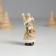 Polystone souvenir "Baby in a hat-hut, in a golden fur coat, with a wreath" 2.2x2.2x5 cm