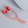 Facial masster "Four wheels", 25 × 9 × 7 cm, orange/red color